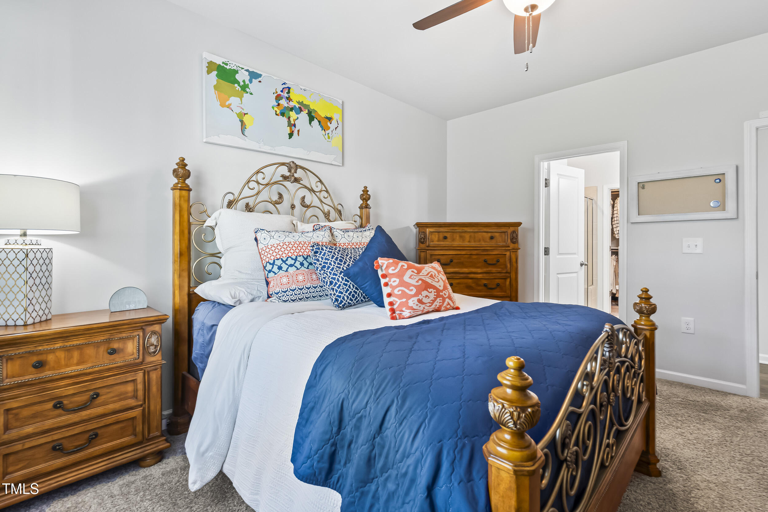 6050 Beale Loop Raleigh, NC 27616 - Photo 15 of 35 a bedroom with a bed and a dresser