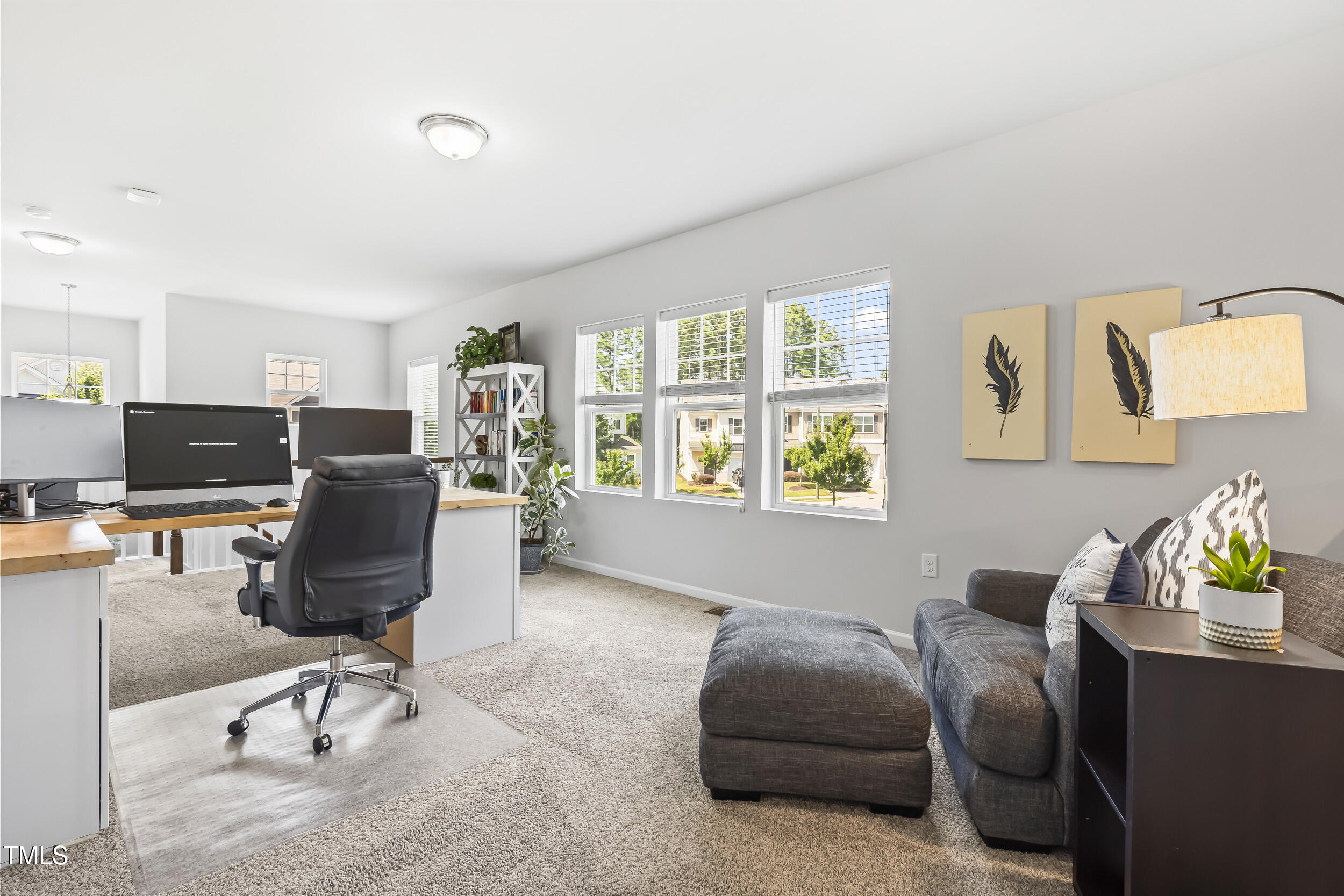 6050 Beale Loop Raleigh, NC 27616 - Photo 22 of 35 a living room with furniture workspace and a window