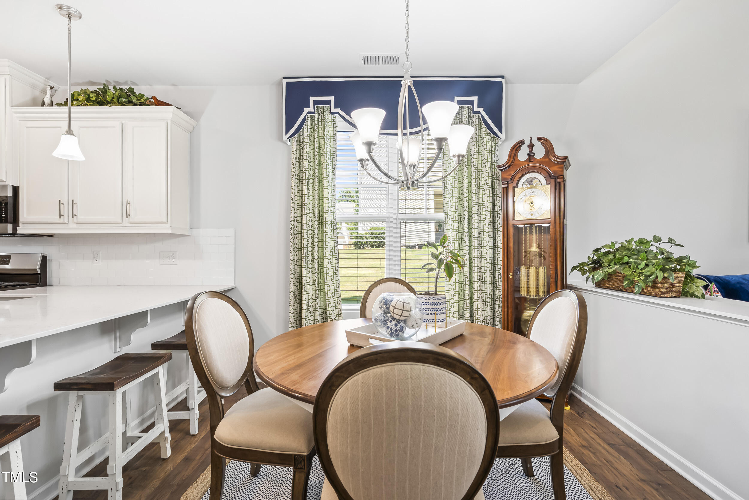 6050 Beale Loop Raleigh, NC 27616 - Photo 8 of 35 a dining room with furniture and window