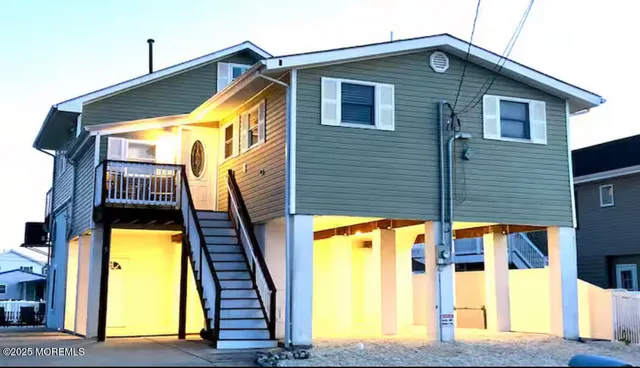 a view of a house with a swimming pool