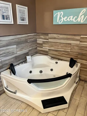 a bathroom with a sink and mirror