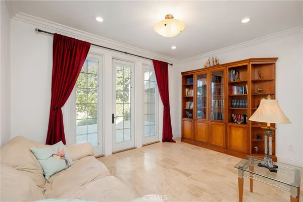 a view of a bedroom with furniture and staircase