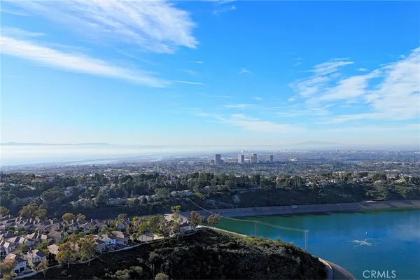 a view of a city with an ocean