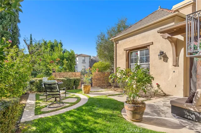 a garden view with a fountain