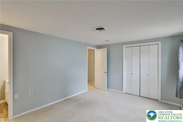a bathroom with a toilet and a sink