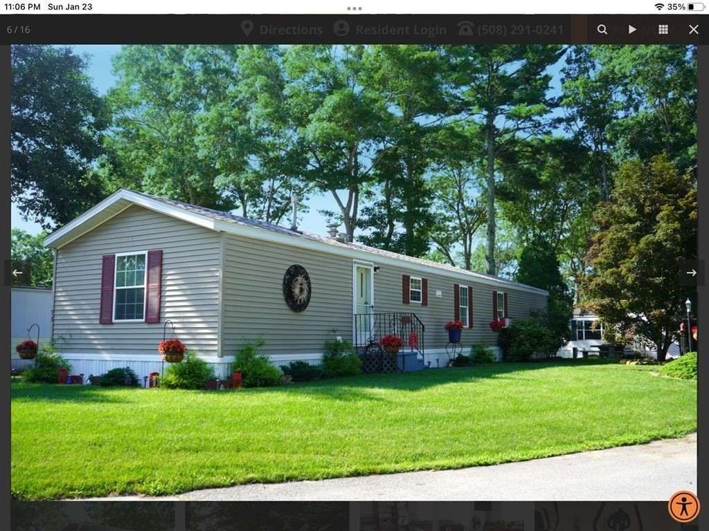 71 Timber Lane Wareham, MA 02571 - Photo 1 of 22 a view of a backyard with plants and large trees