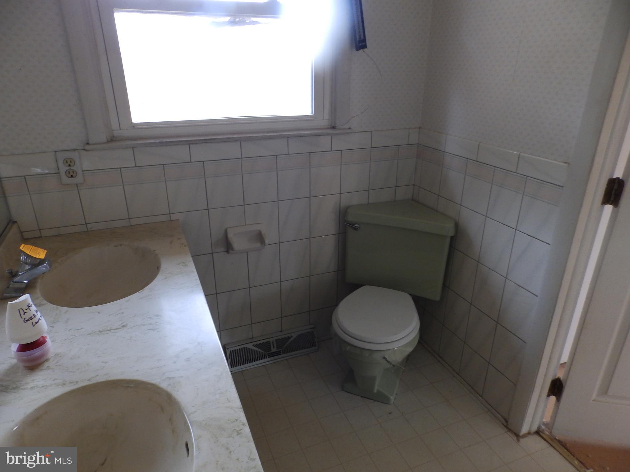 3395 Weldon Road New Windsor, MD 21776 - Photo 17 of 34 a bathroom with a sink and a toilet