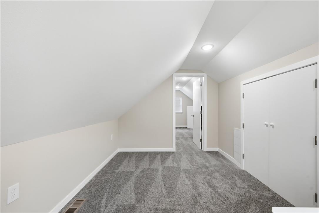 5641 North Coplay Road Whitehall, PA 18052 - Photo 41 of 68 A well-lit attic space offers flexible living with comfortable carpeting and practical storage.