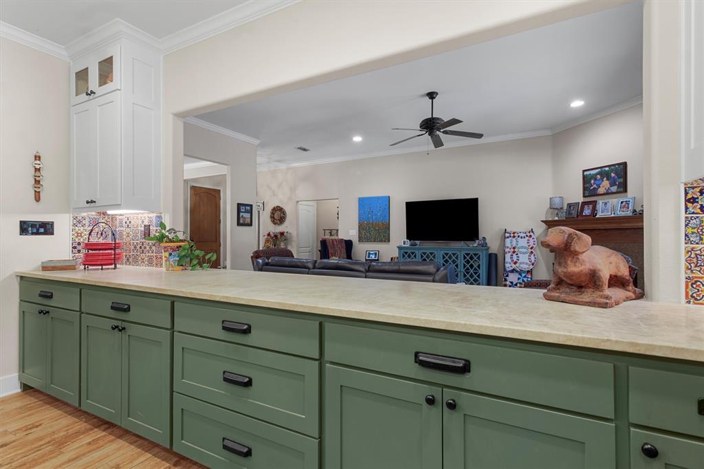 18551 Lazy Lane Flint, TX 75762 - Photo 17 of 39 a living room with hard wood floors and a flat screen tv