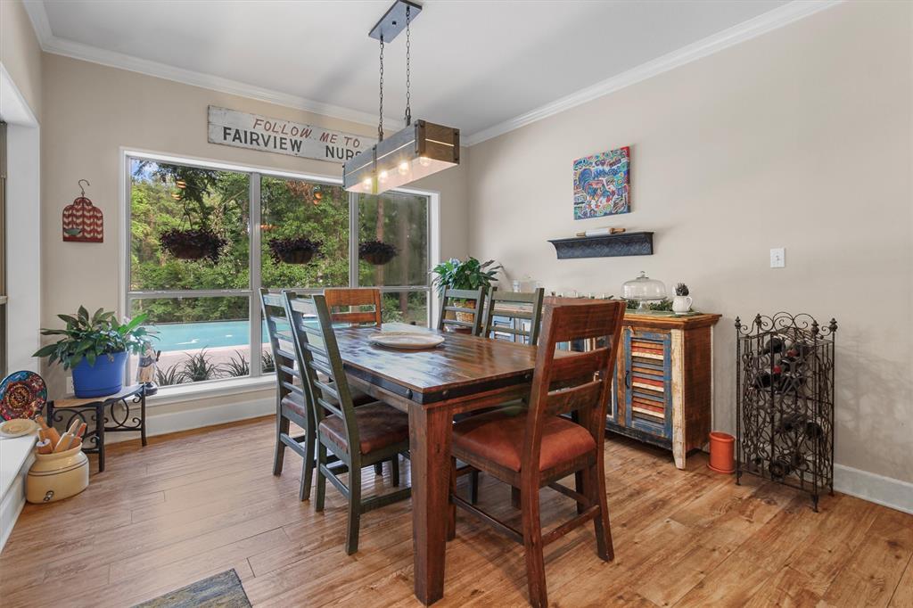 18551 Lazy Lane Flint, TX 75762 - Photo 18 of 39 a view of a dining room with furniture window and wooden floor