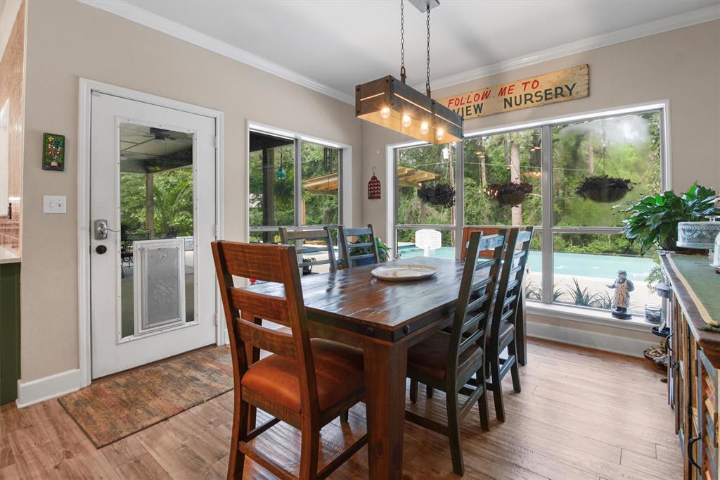 18551 Lazy Lane Flint, TX 75762 - Photo 19 of 39 a view of a dining room with furniture window and outside view