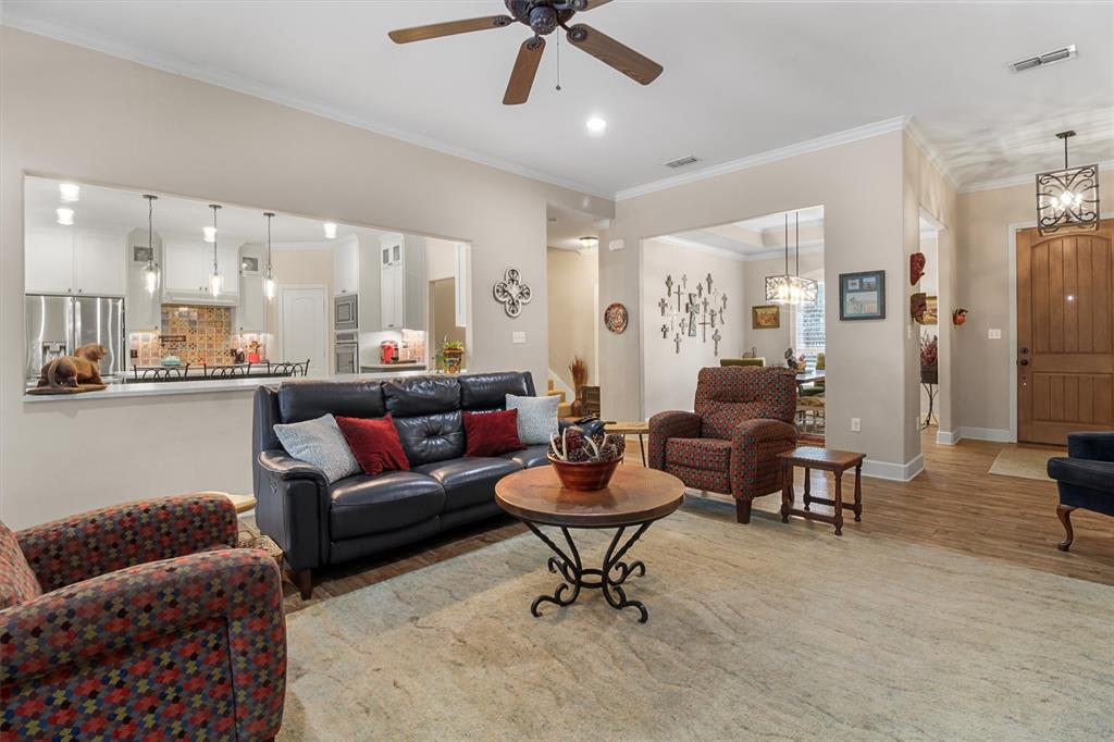 18551 Lazy Lane Flint, TX 75762 - Photo 10 of 39 a living room with furniture and a view of kitchen