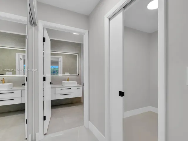 a view of a lake with a house in the background