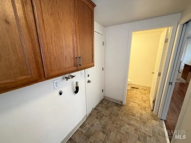 a bathroom with a sink toilet and vanity