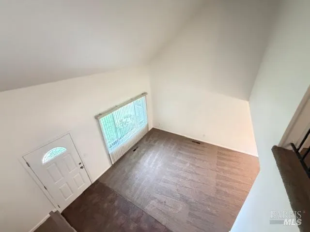 a view of a hallway with staircase