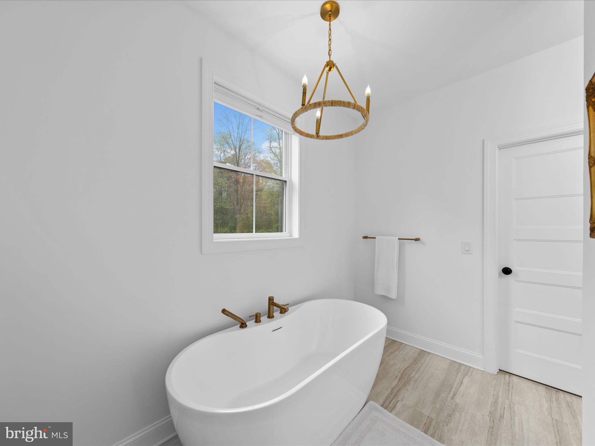 20005 Devine Way Milton, DE 19968 - Photo 29 of 82 a bathroom with a sink and a mirror