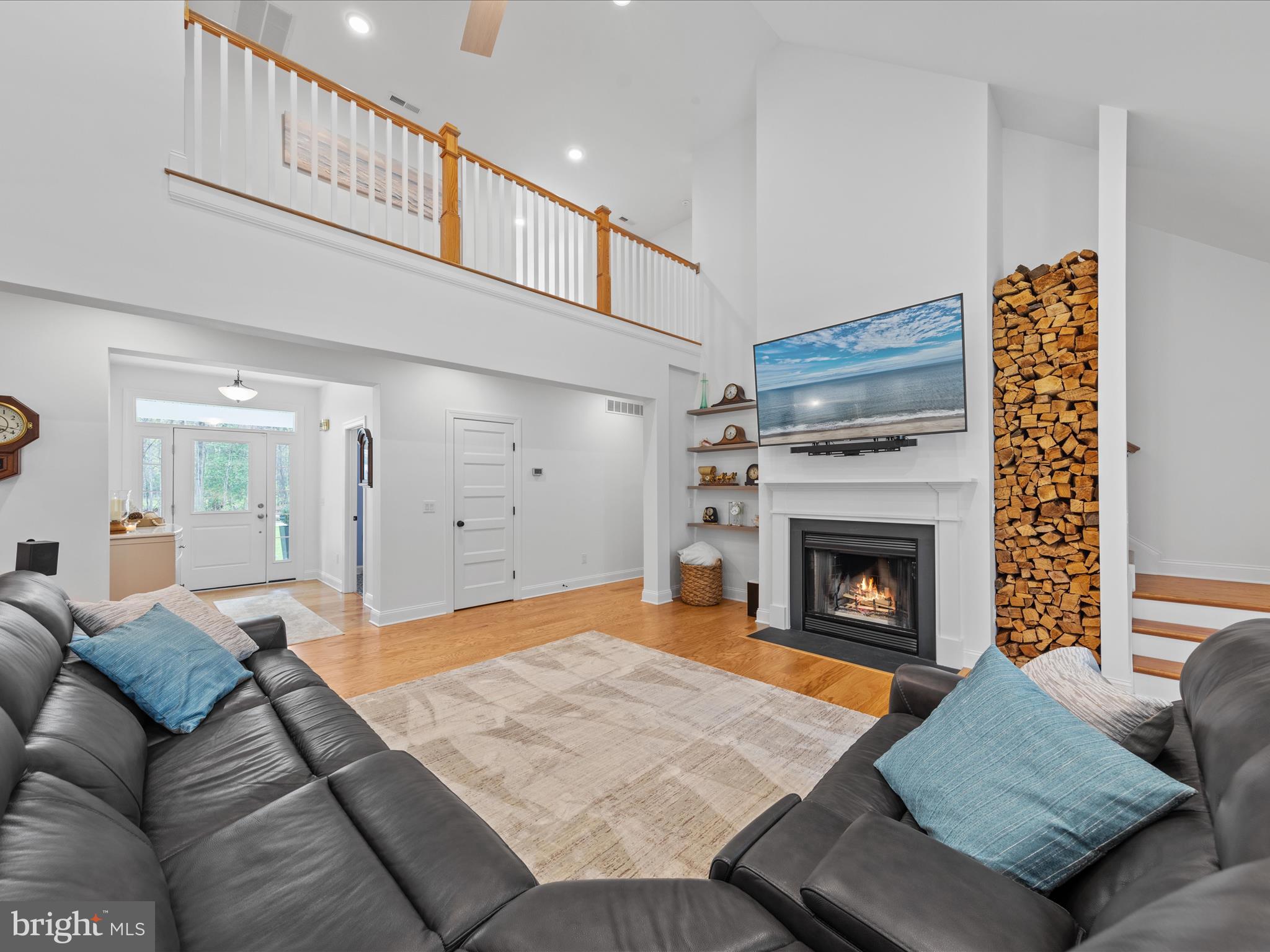 20005 Devine Way Milton, DE 19968 - Photo 3 of 82 a living room with furniture and a fireplace