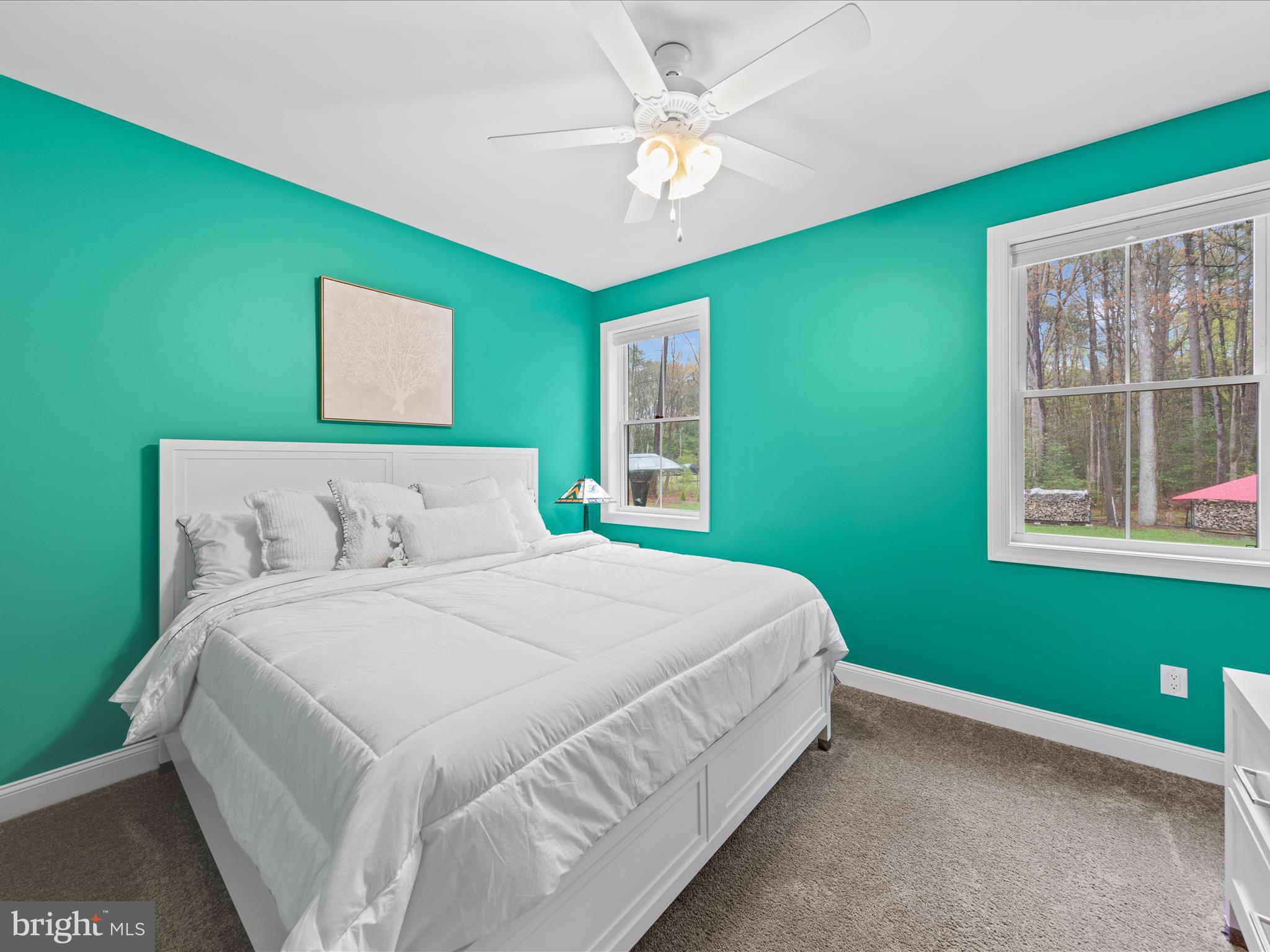 20005 Devine Way Milton, DE 19968 - Photo 38 of 82 a bedroom with a bed and a window