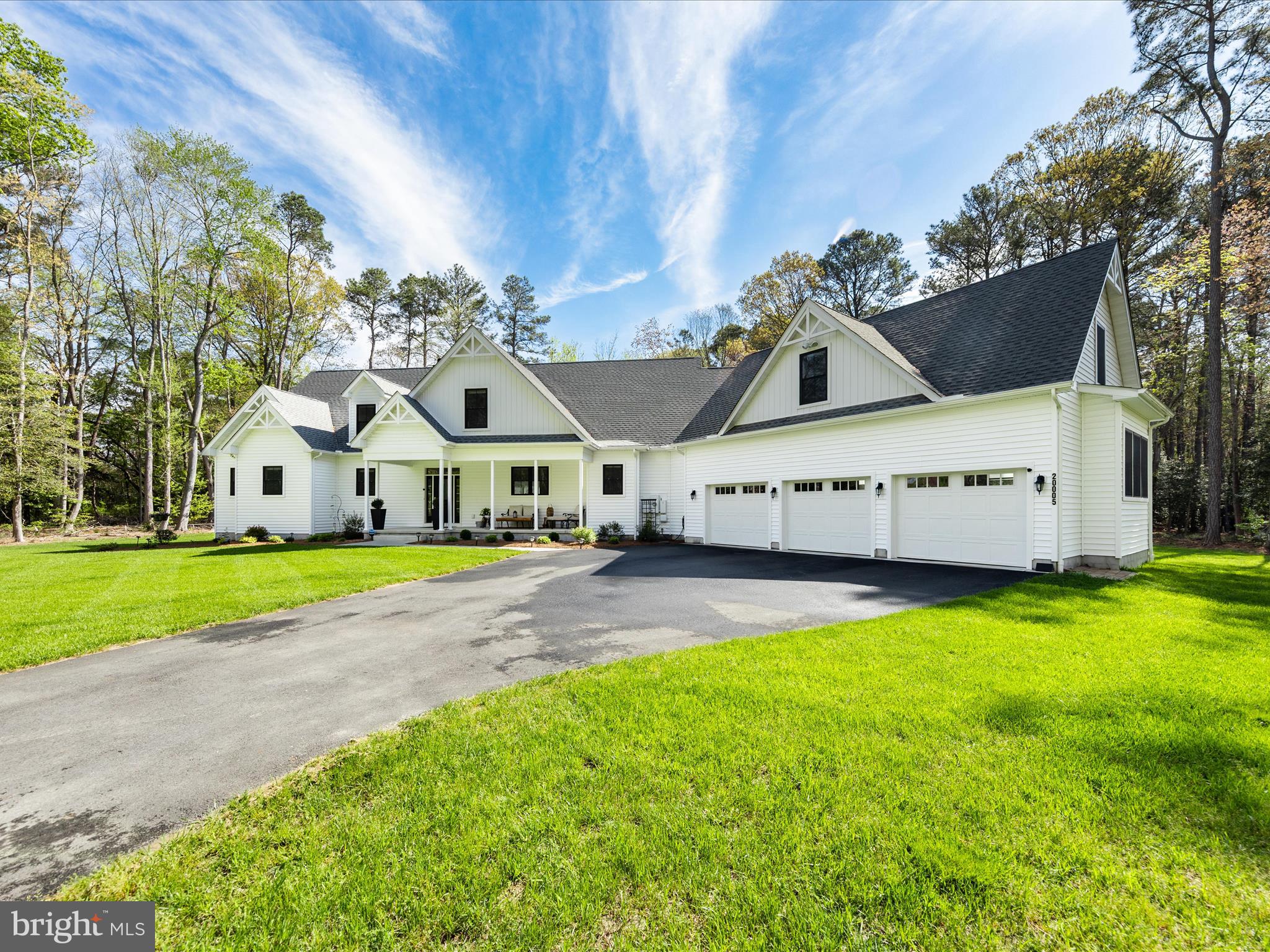 20005 Devine Way Milton, DE 19968 - Photo 64 of 82 a view of a house with a big yard and large trees