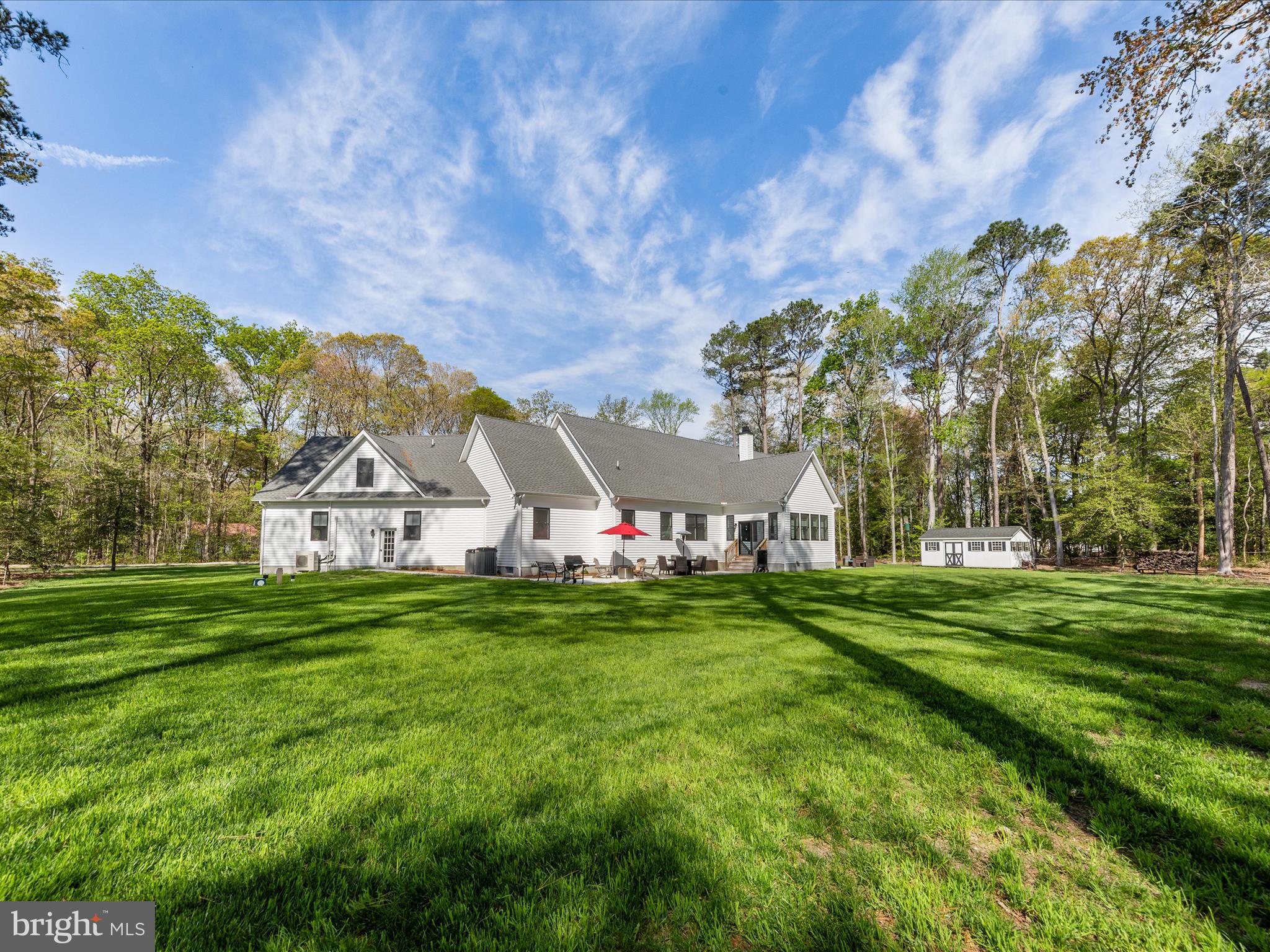 20005 Devine Way Milton, DE 19968 - Photo 74 of 82 a front view of a house with a garden
