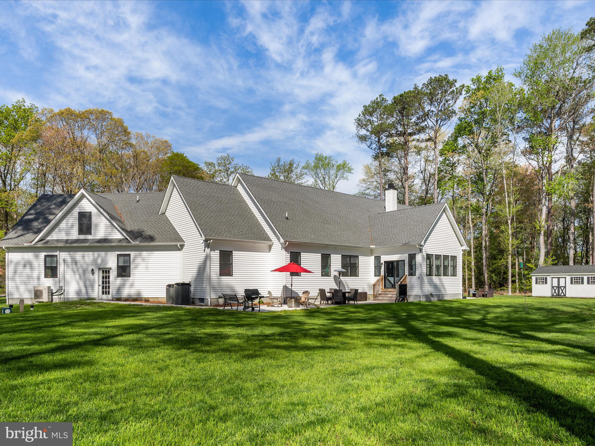 20005 Devine Way Milton, DE 19968 - Photo 75 of 82 a front view of house with yard and green space