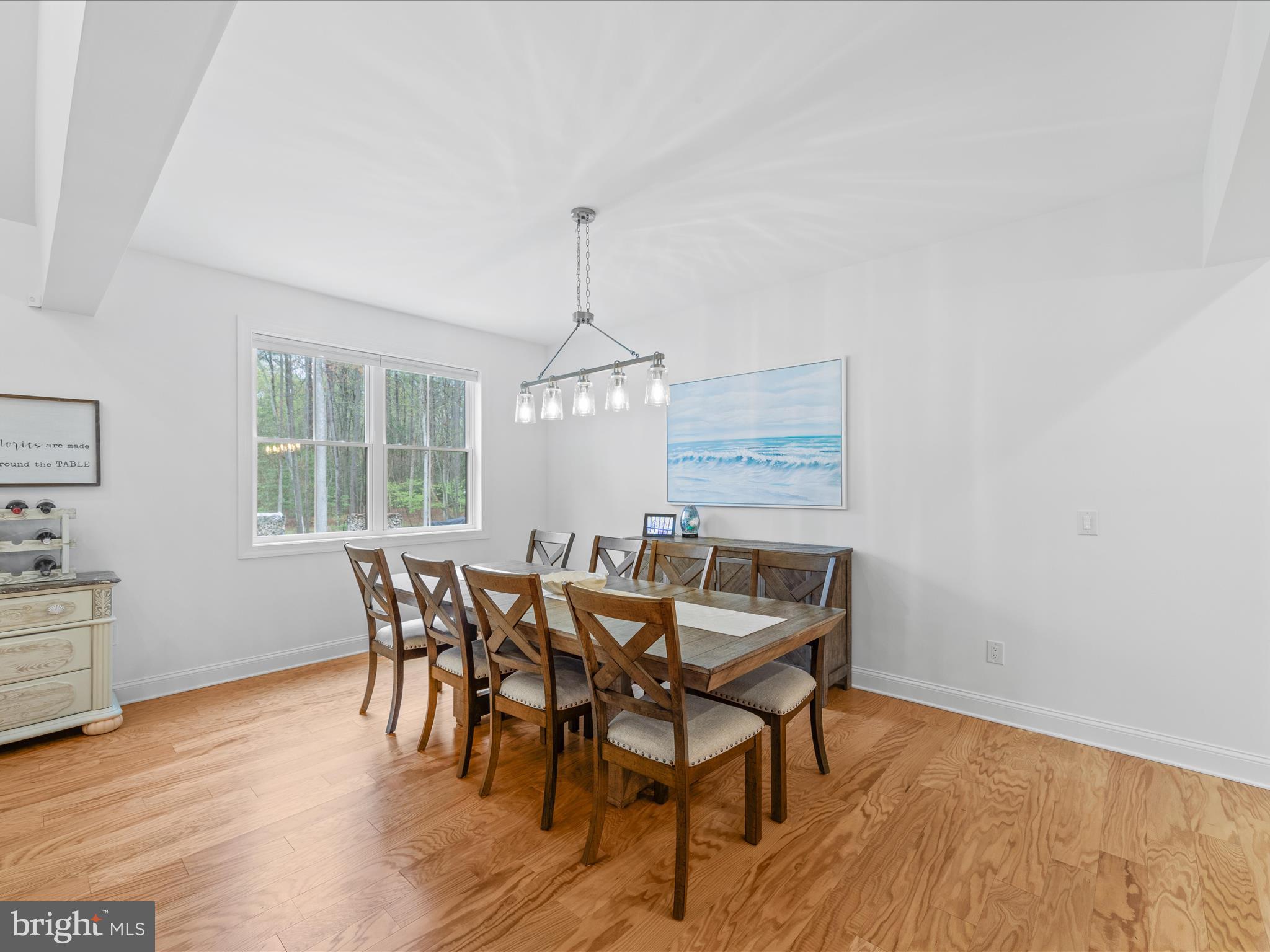 20005 Devine Way Milton, DE 19968 - Photo 9 of 82 a view of a dining room with furniture window and wooden floor