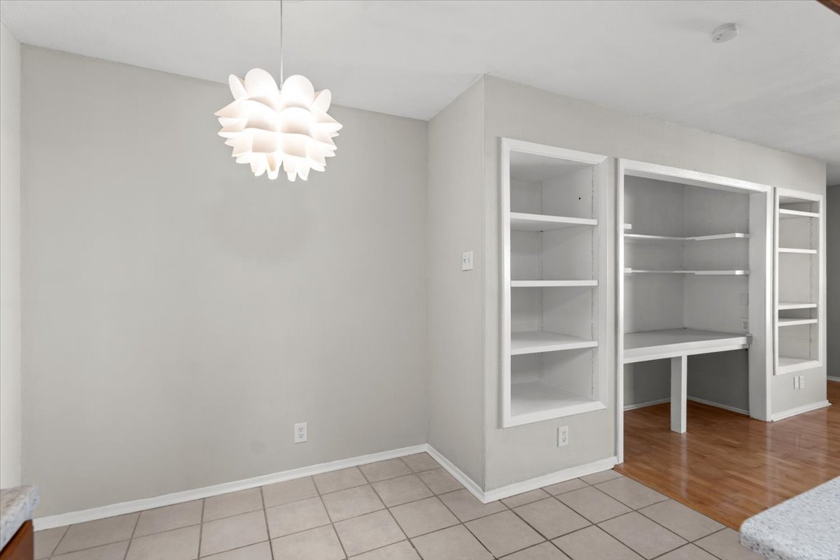 910 Duncan Lane, Unit 57 Austin, TX 78705 - Photo 16 of 34 a view of an empty room with a window