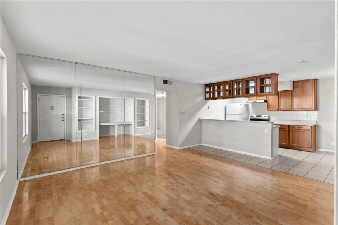 910 Duncan Lane, Unit 57 Austin, TX 78705 - Photo 4 of 34 a view of a kitchen with a sink