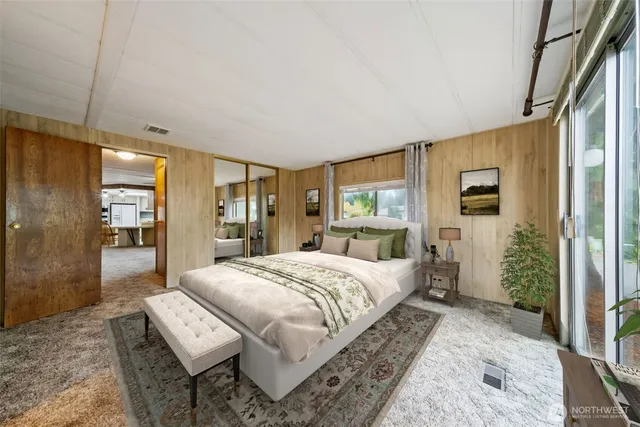 a view of empty room with floor to ceiling window