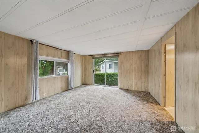 a bathroom with a double vanity sink toilet mirror and shower