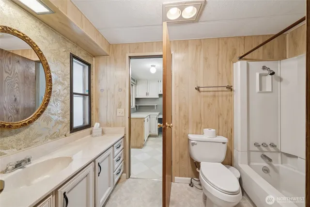 a view of a porch with wooden floor and roof