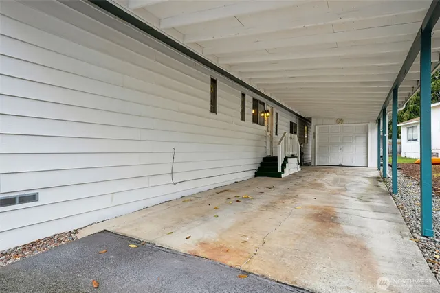 a view of a room with wooden walls