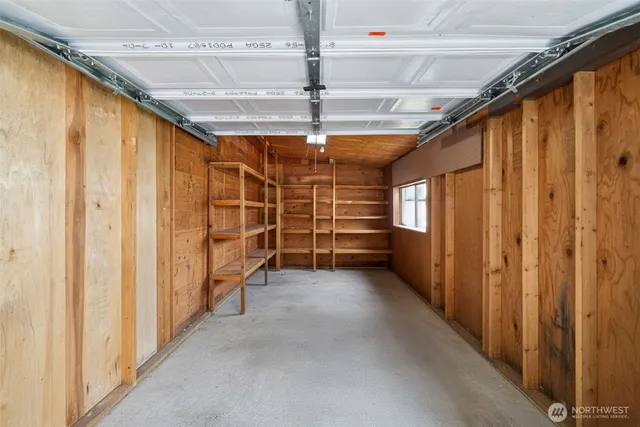 an aerial view of a house with a swimming pool