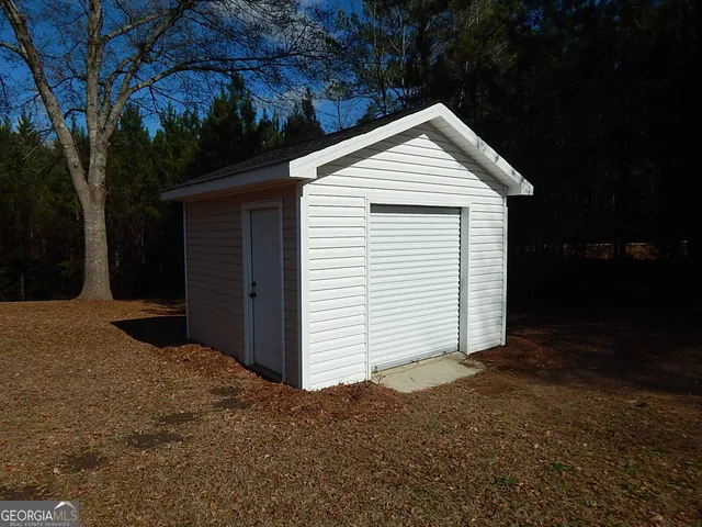 a view of backyard of house