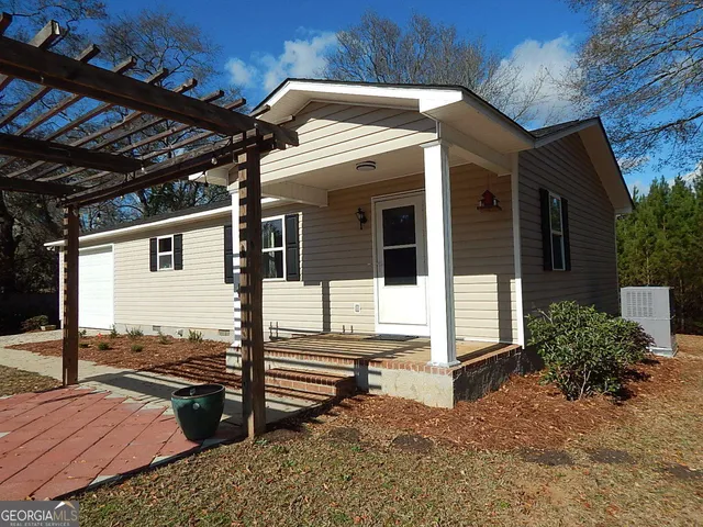 a view of a house with a porch