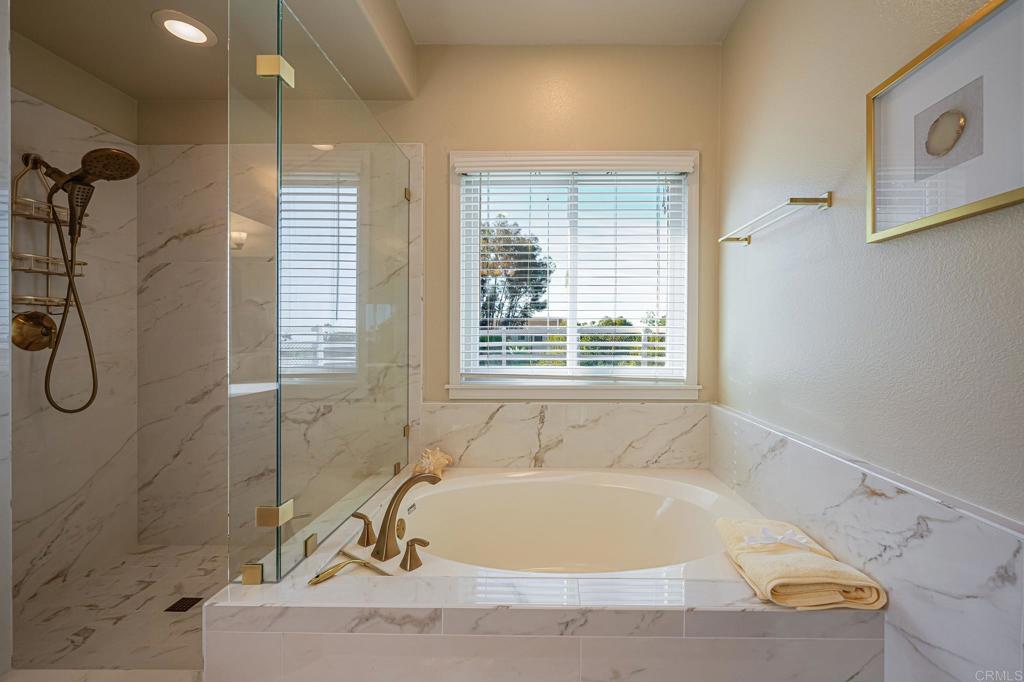 30606 Falling Star Circle Valley Center, CA 92082 - Photo 18 of 70 a white bath tub sitting next to a window
