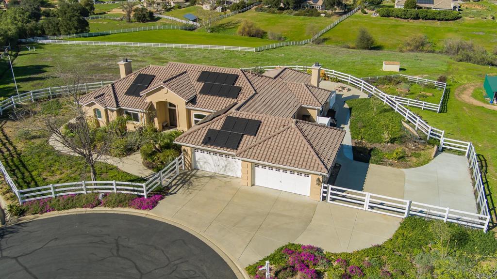 30606 Falling Star Circle Valley Center, CA 92082 - Photo 2 of 70 an aerial view of a house with a big yard