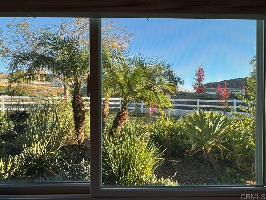 30606 Falling Star Circle Valley Center, CA 92082 - Photo 26 of 70 a view of swimming pool from a window