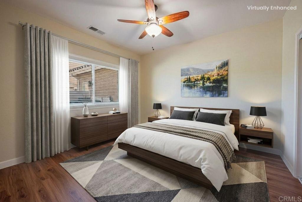 30606 Falling Star Circle Valley Center, CA 92082 - Photo 27 of 70 a bedroom with a bed dresser and a window