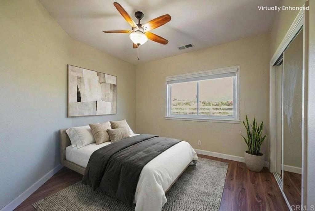 30606 Falling Star Circle Valley Center, CA 92082 - Photo 29 of 70 a bed room with a bed and a window