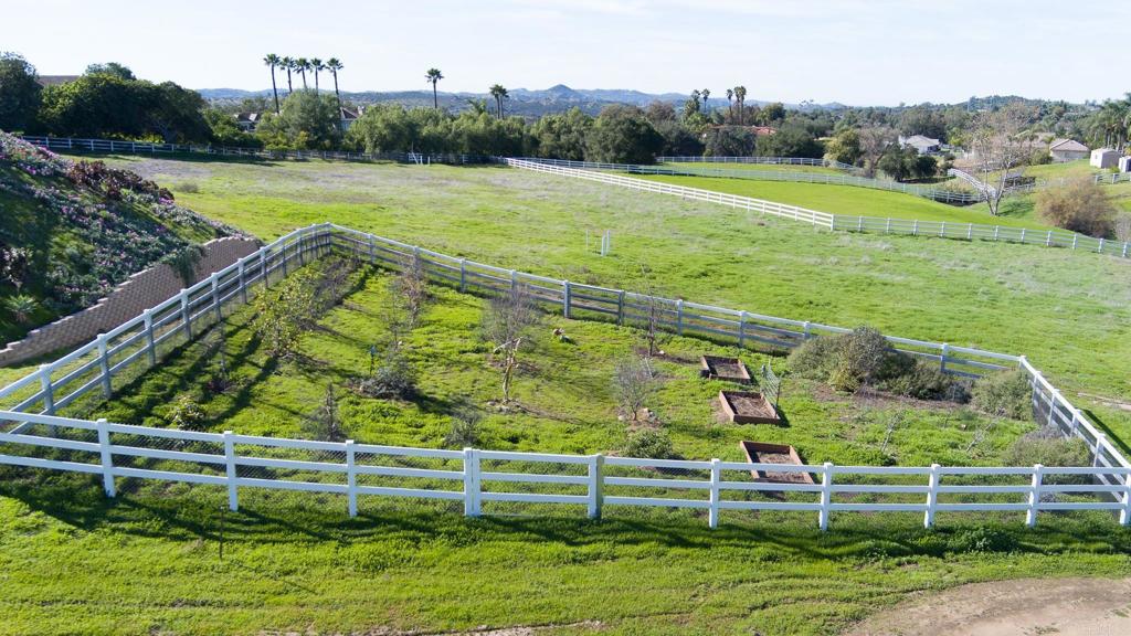 30606 Falling Star Circle Valley Center, CA 92082 - Photo 50 of 70 a view of a swimming pool with a yard
