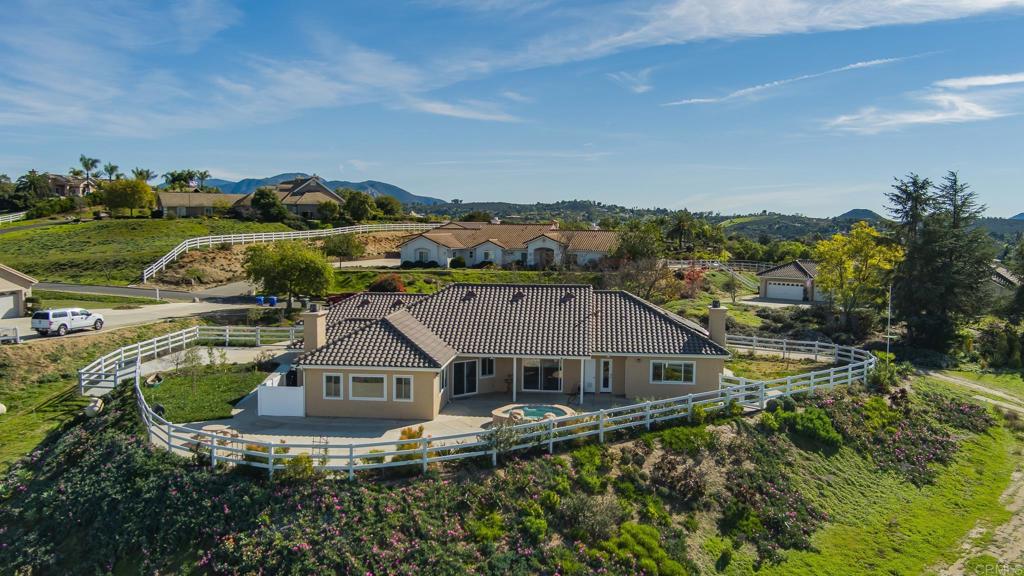 30606 Falling Star Circle Valley Center, CA 92082 - Photo 65 of 70 an aerial view of residential houses with outdoor space and trees