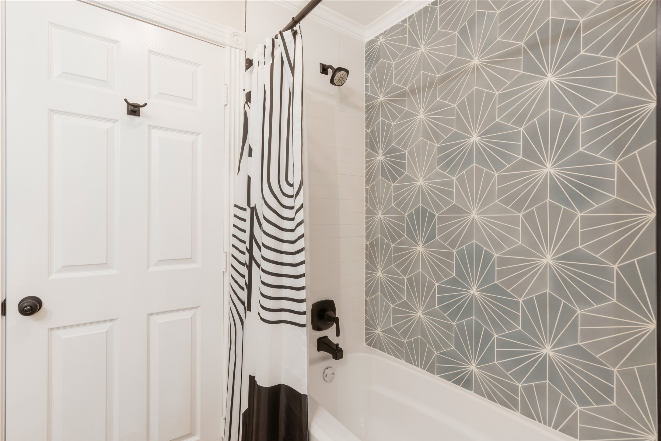 6211 Kingscrest Lane Spring, TX 77389 - Photo 29 of 39 a bathroom with a bathtub and shower