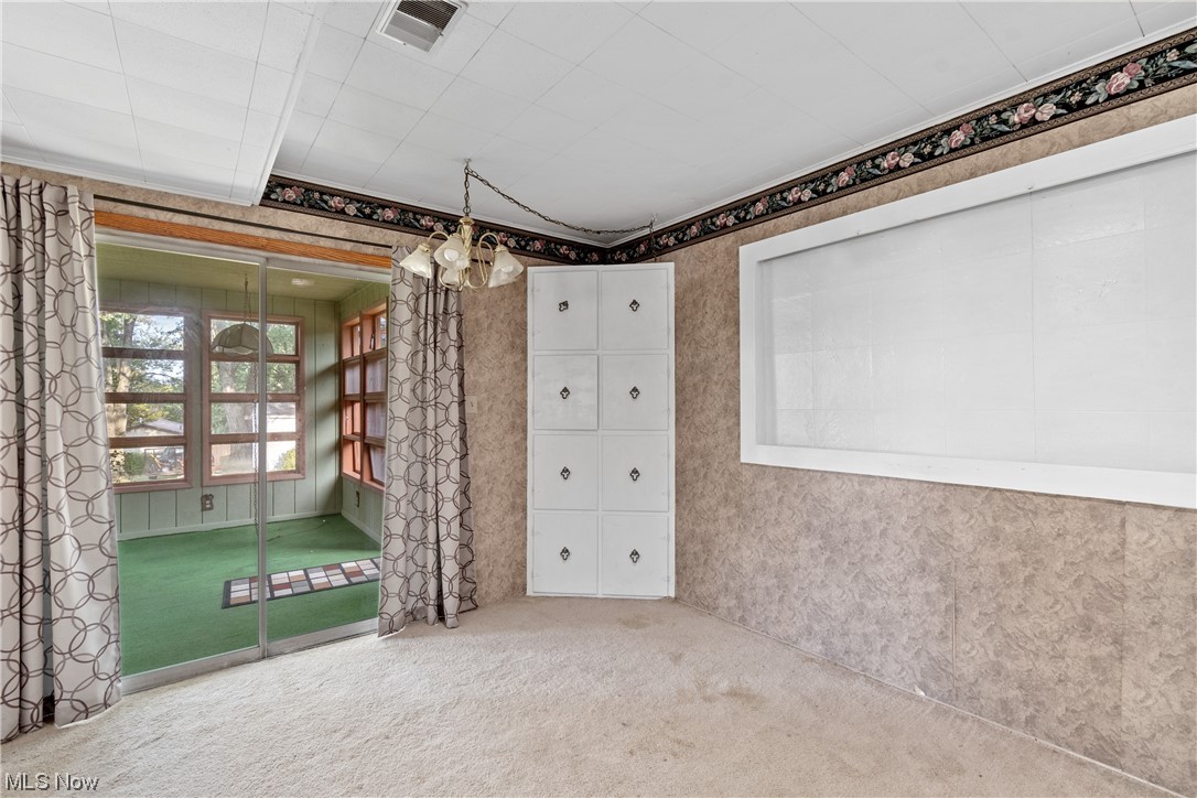 120 Lester Road New Franklin, OH 44319 - Photo 11 of 24 Unfurnished room with light carpet