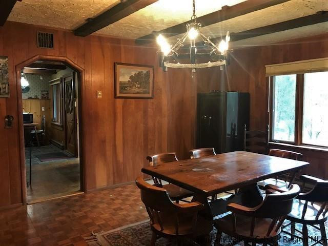 102 Valenti Road Gilboa, NY 12076 - Photo 12 of 32 a view of a dinning table and chairs in the balcony