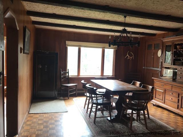 102 Valenti Road Gilboa, NY 12076 - Photo 13 of 32 a view of a dining room with furniture and window