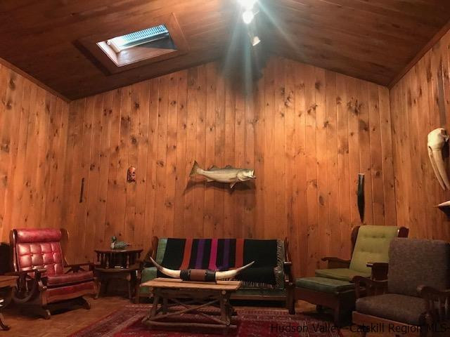 102 Valenti Road Gilboa, NY 12076 - Photo 15 of 32 a living room with furniture and a window