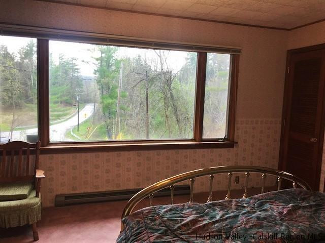 102 Valenti Road Gilboa, NY 12076 - Photo 20 of 32 a bathroom with a sink and a window