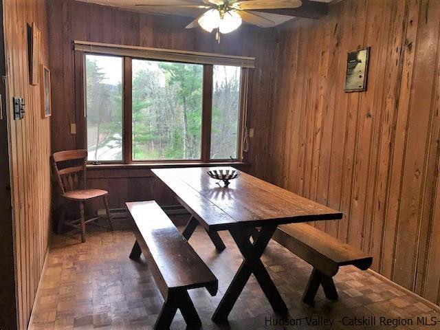 102 Valenti Road Gilboa, NY 12076 - Photo 8 of 32 a view of a dining room with furniture window and outside view
