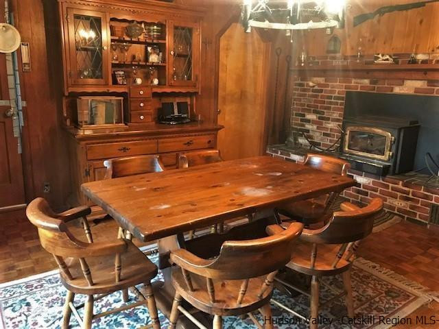 102 Valenti Road Gilboa, NY 12076 - Photo 10 of 32 a patio with table and chairs and potted plants